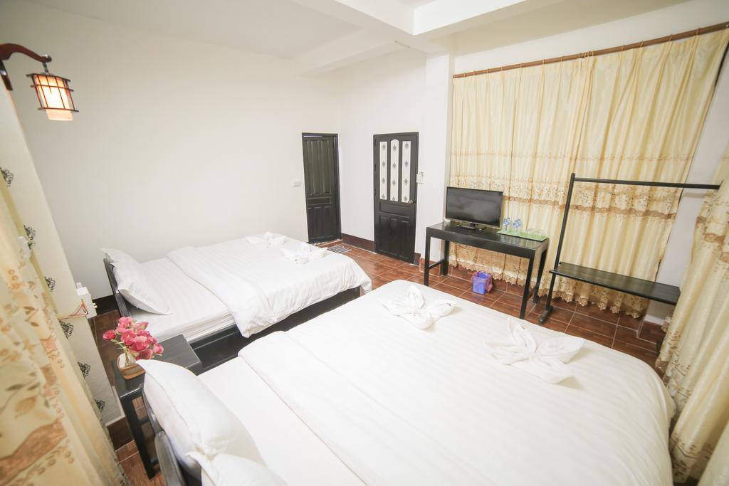 เมเล เกสต์เฮ้าส์ Hotel วังเวียง ภายนอก รูปภาพ